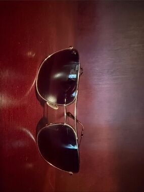 Maui Jim Gold Aviator Sunglasses with Dark Lenses